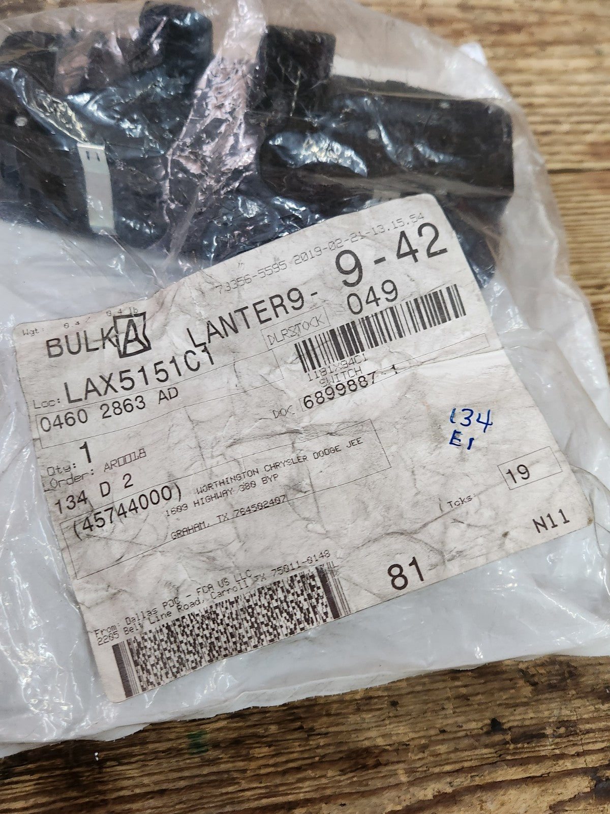 6953411