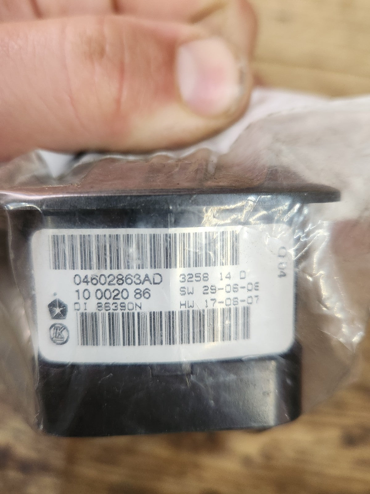 6953411