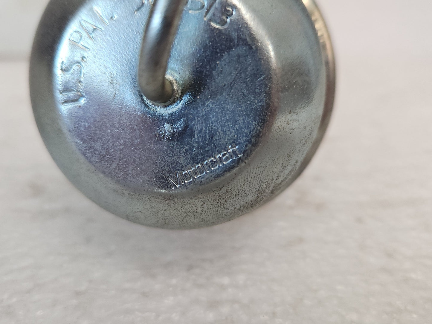 7672393