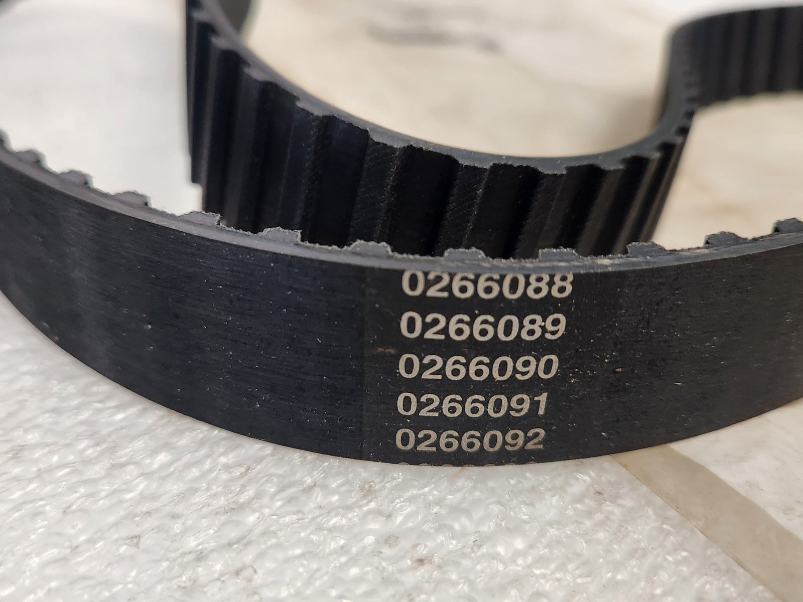 7695359
