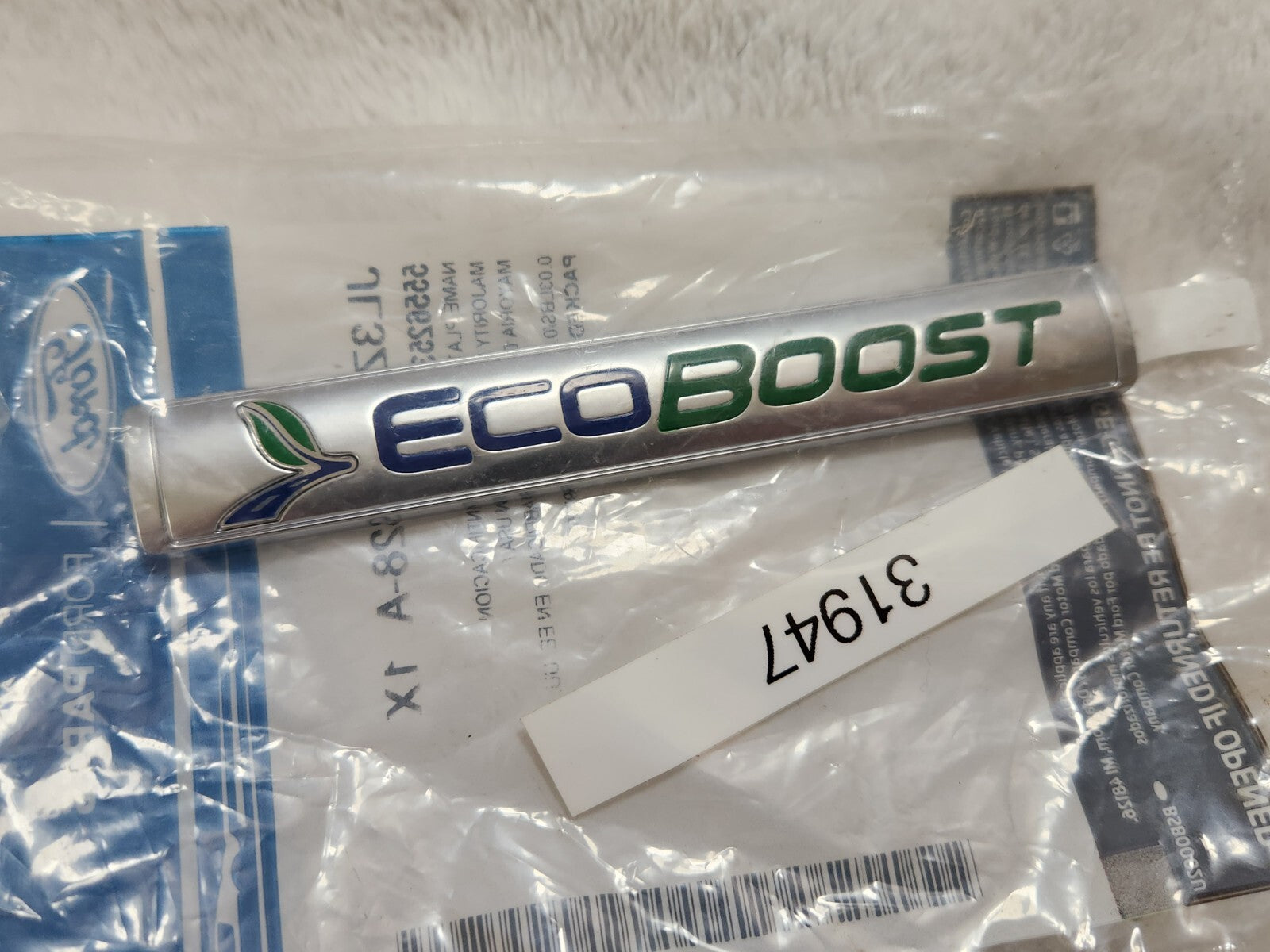 7006834