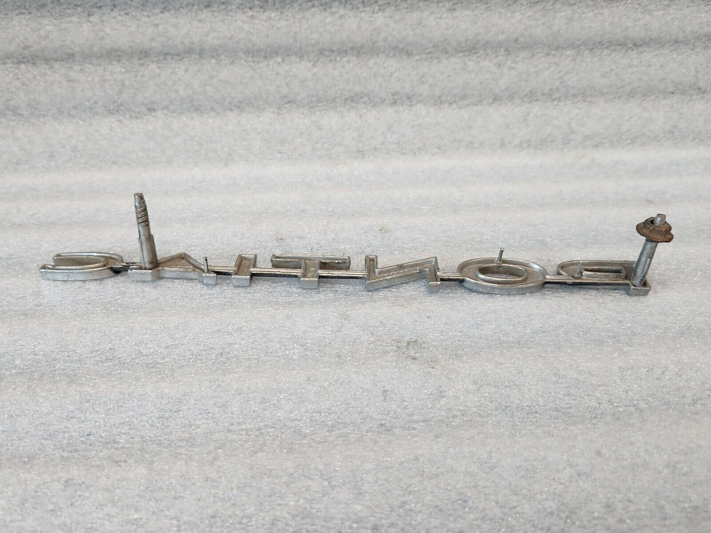 NOS 1969 69 Pontiac Tempest LeMans Emblem Name Plate Ornament Grill 9796046