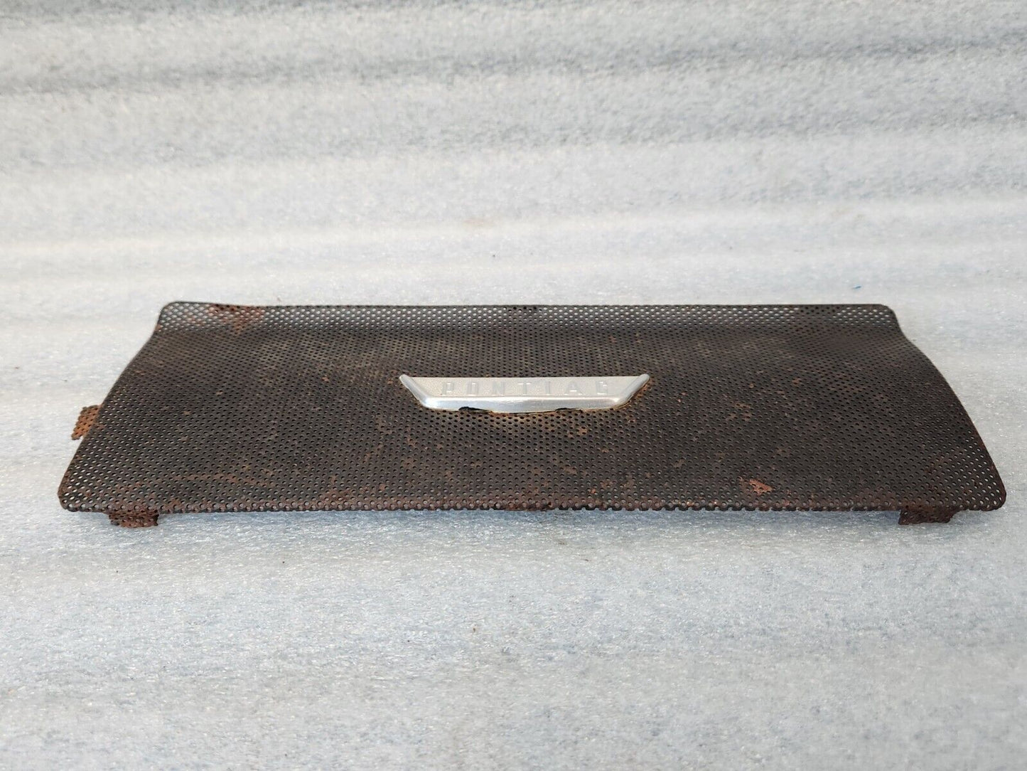 1956 PONTIAC CHIEFTAIN SPEAKER GRILLE w/ METAL EMBLEM OEM GM