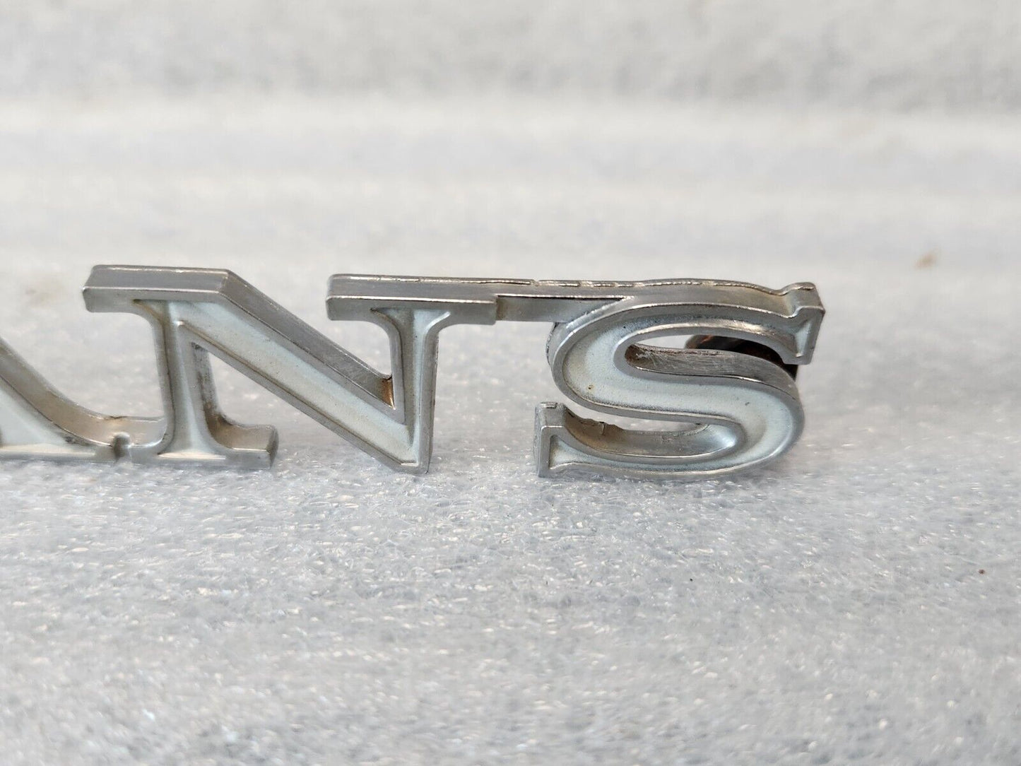 1970 PONTIAC LEMANS  QUARTER PANEL EMBLEM ORIGINAL GM PART NUMBER 9808250