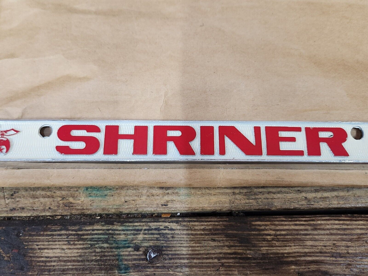 NEW NOS Vintage PROUD TO BE A SHRINER Metal Chrome Embossed License Plate Frame