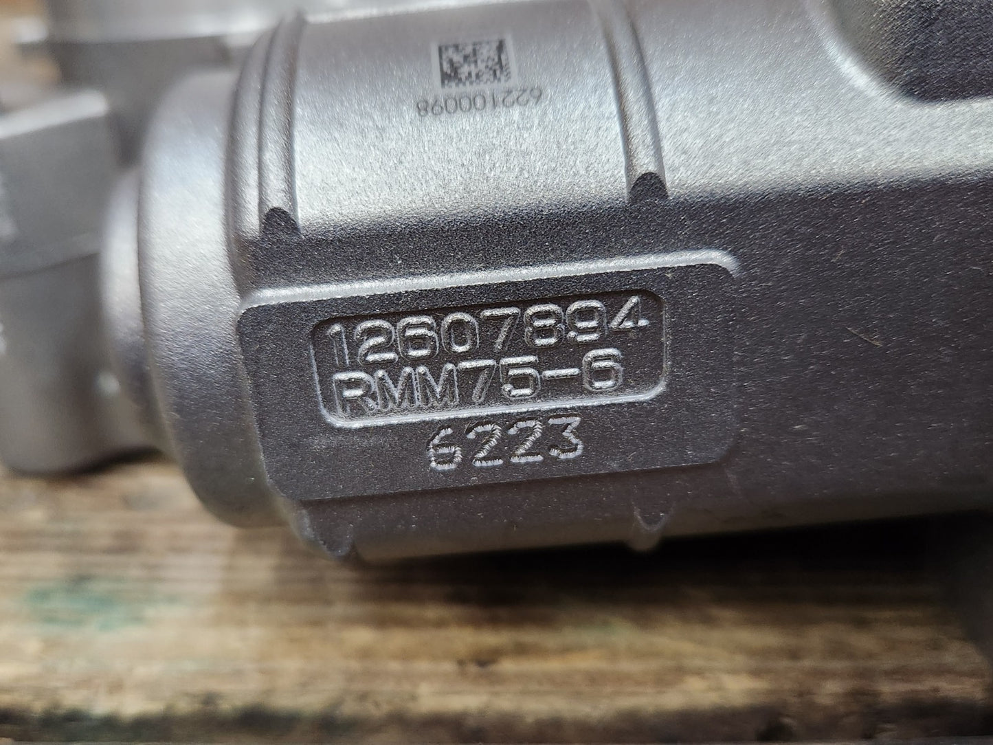 6997208