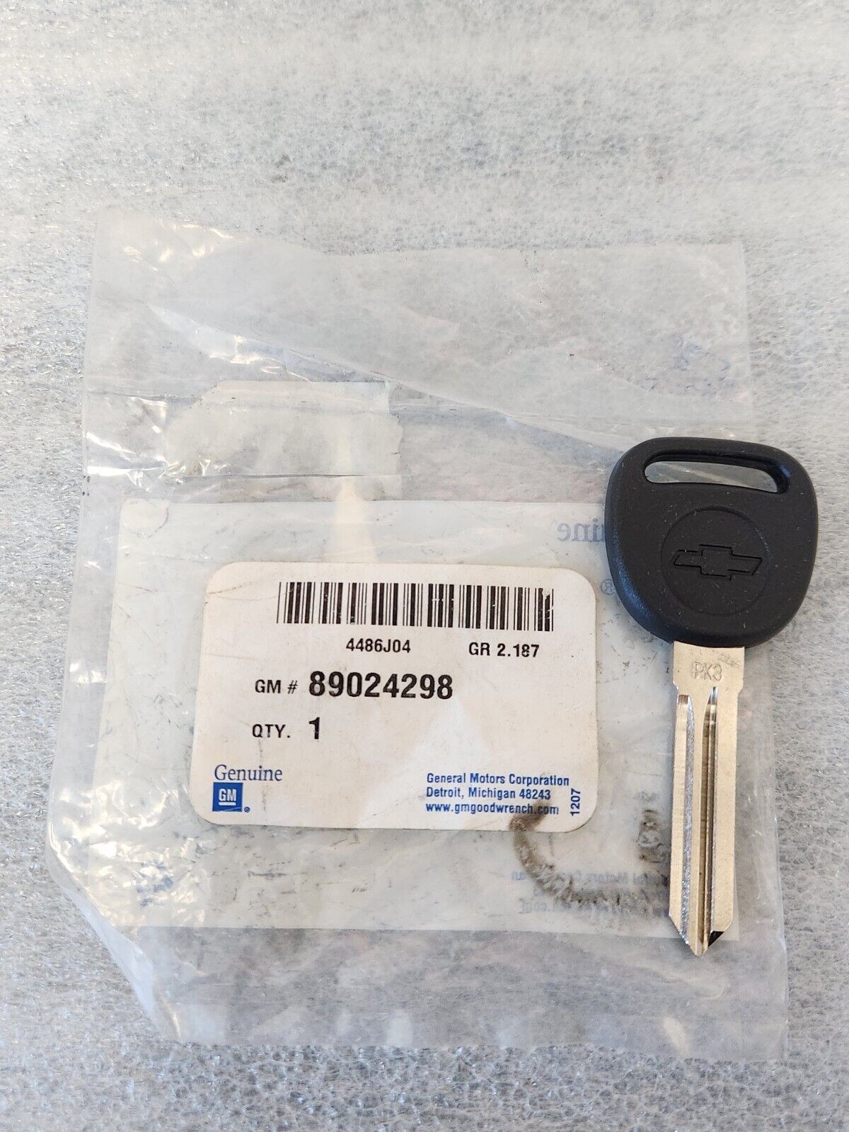 NOS OEM GM PK3 Key Blank Part # 89024298 Chevrolet Bowtie Logo