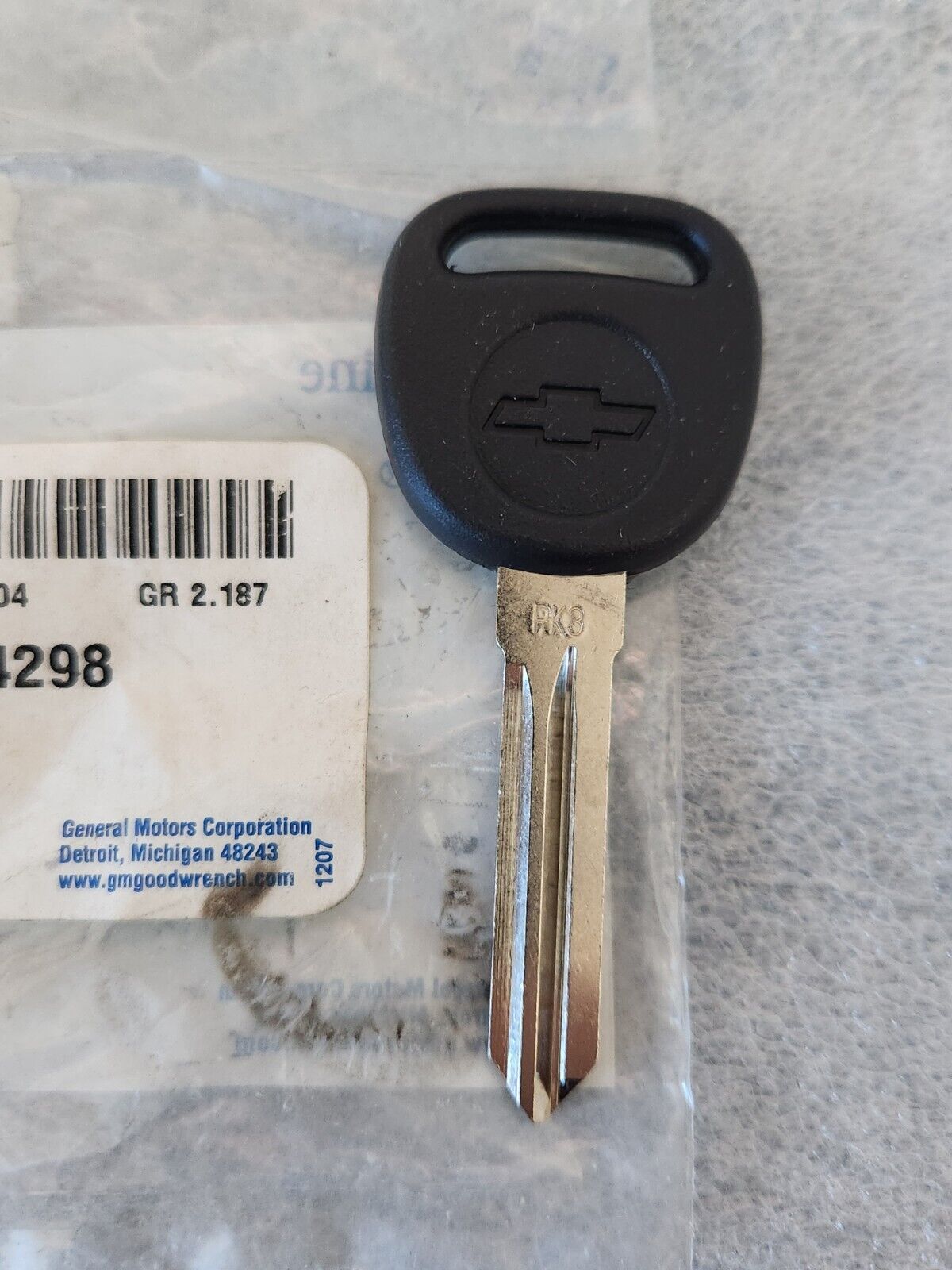 NOS OEM GM PK3 Key Blank Part # 89024298 Chevrolet Bowtie Logo