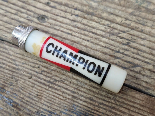 Vintage Round Plastic Advertiser Lighter Champion Spark Plugs RARE Gas Oil