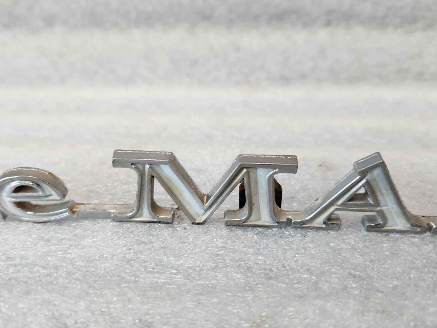 1970 PONTIAC LEMANS  QUARTER PANEL EMBLEM ORIGINAL GM PART NUMBER 9808250