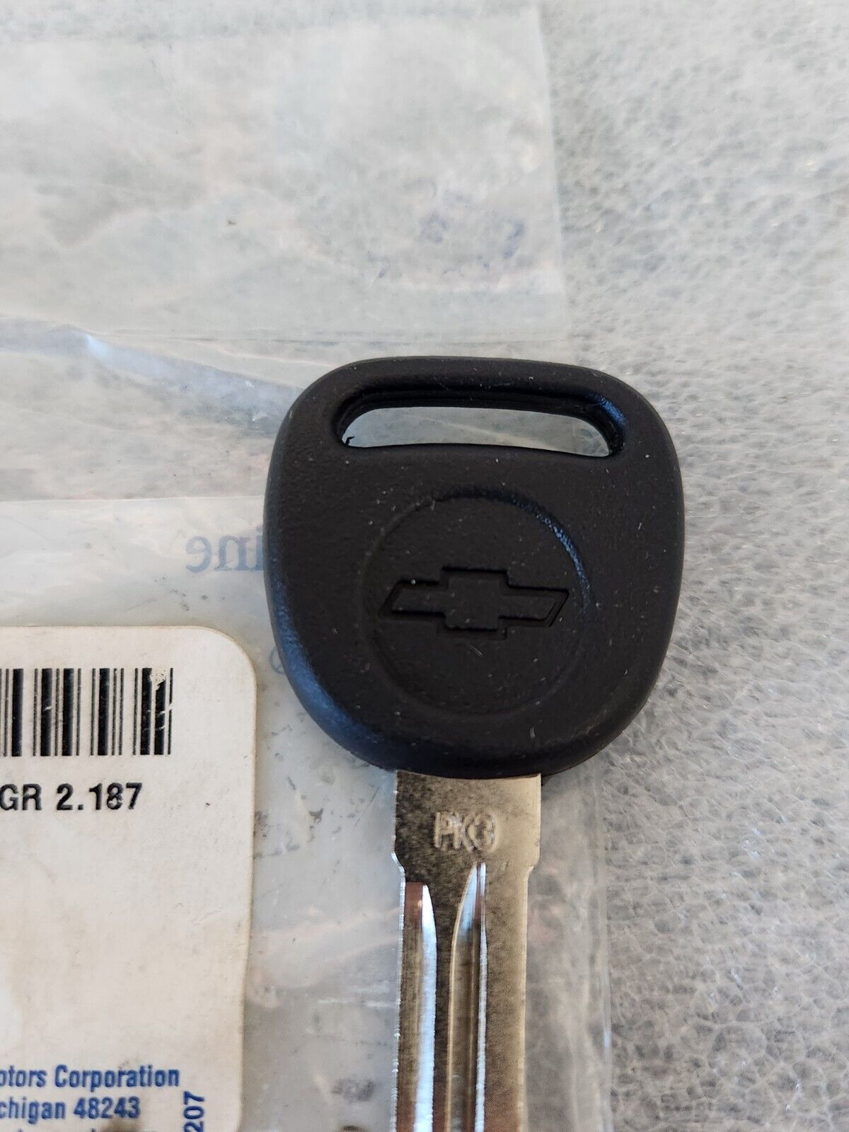 NOS OEM GM PK3 Key Blank Part # 89024298 Chevrolet Bowtie Logo