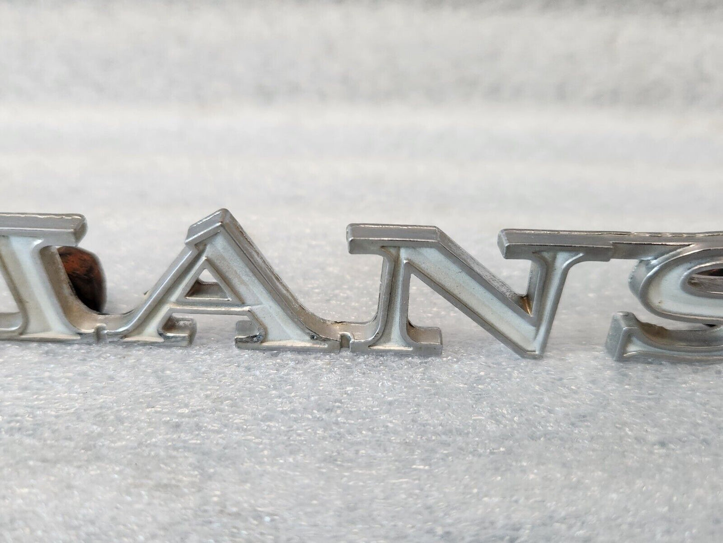 1970 PONTIAC LEMANS  QUARTER PANEL EMBLEM ORIGINAL GM PART NUMBER 9808250