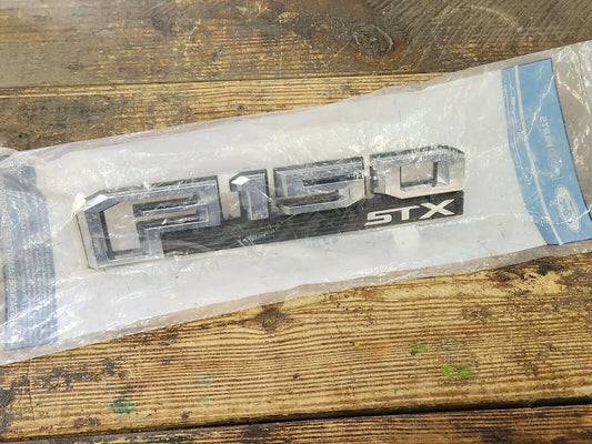 NEW OEM 2018 - 2020 Ford F150 STX Nameplate Emblem LH Driver Side chrome & black