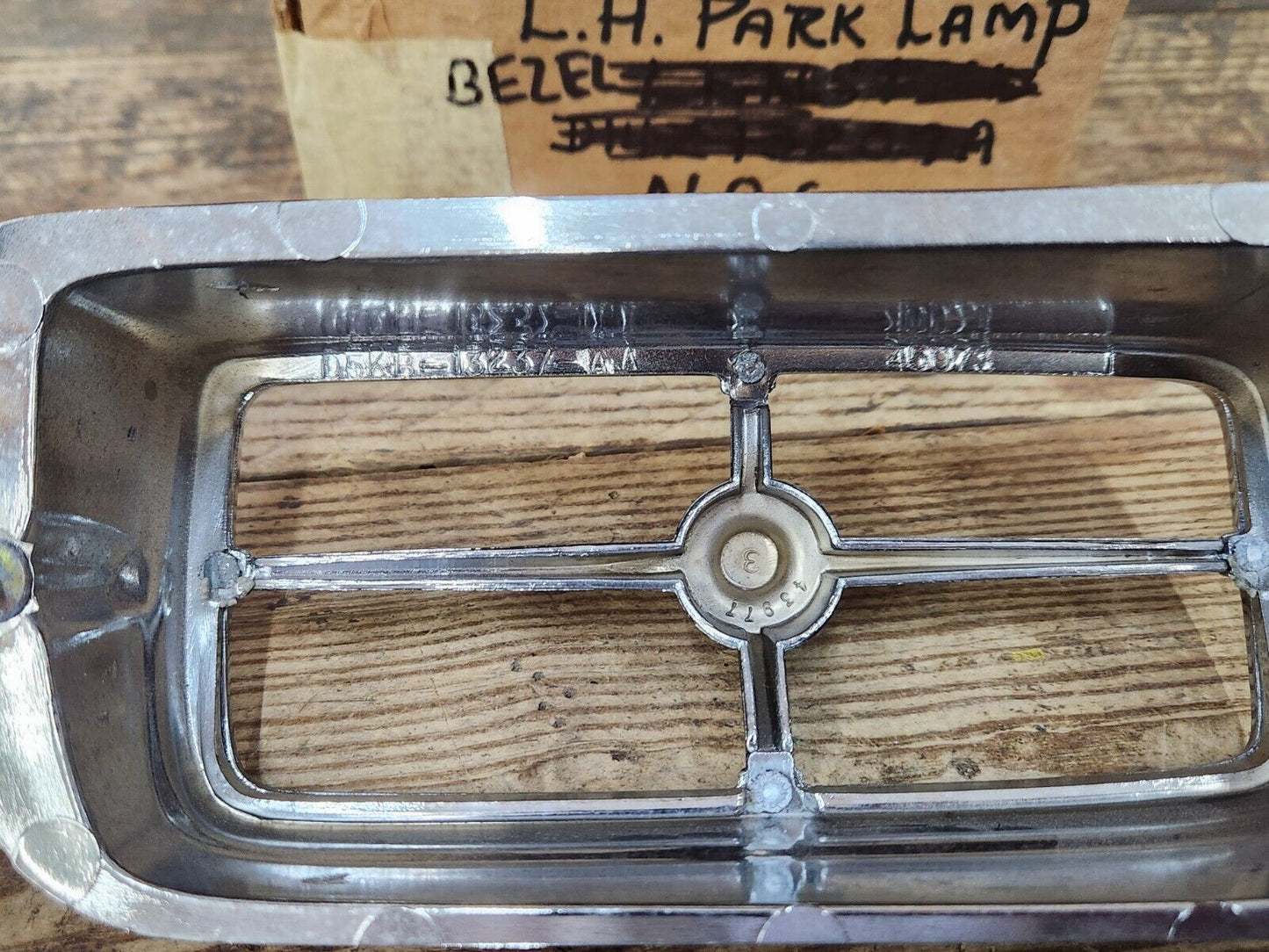 NOS OEM 1975 1976 Ford Maverick Comet Bezel Parking Light LH Side D5KB-13237-AA