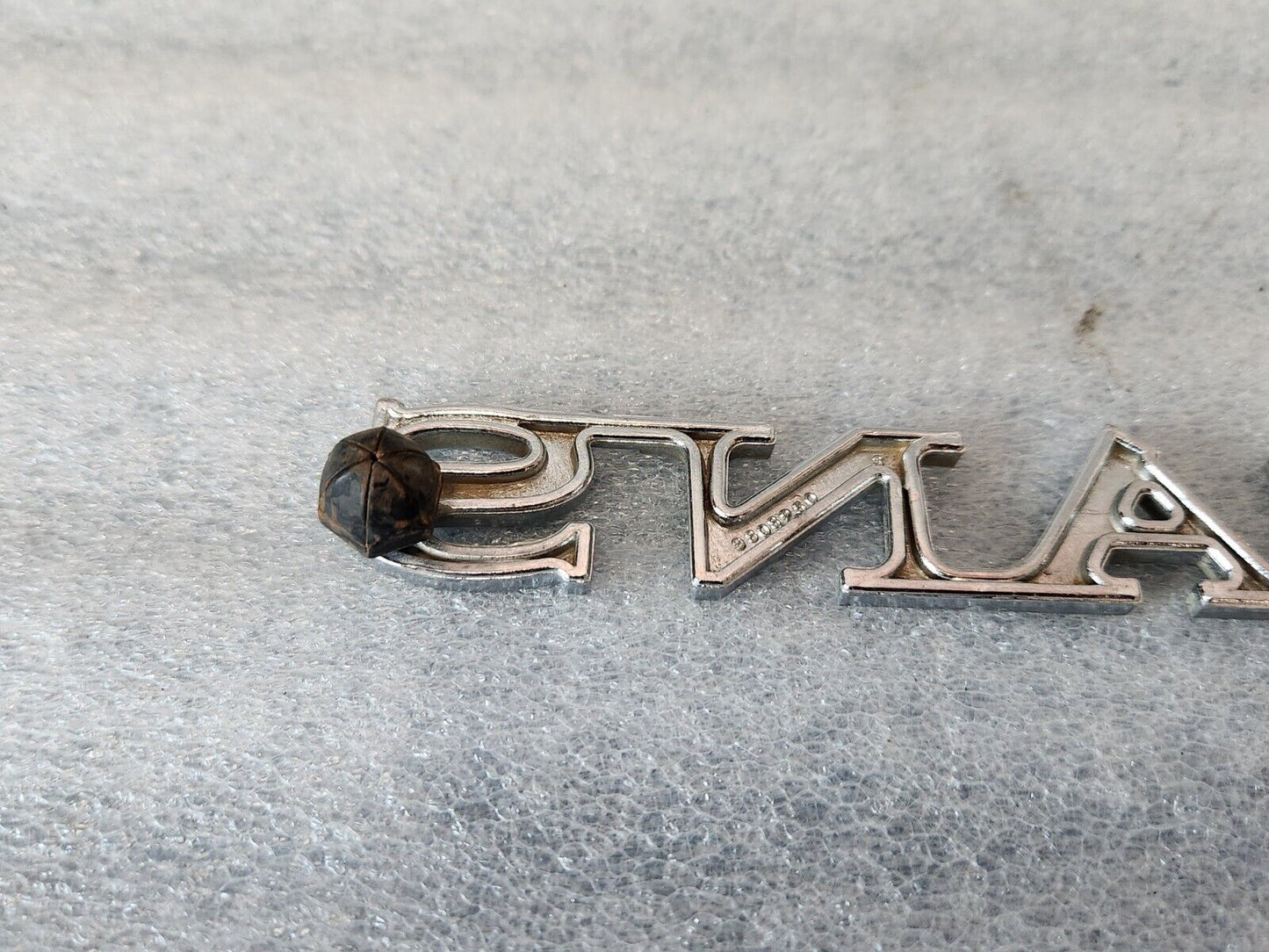 1970 PONTIAC LEMANS  QUARTER PANEL EMBLEM ORIGINAL GM PART NUMBER 9808250
