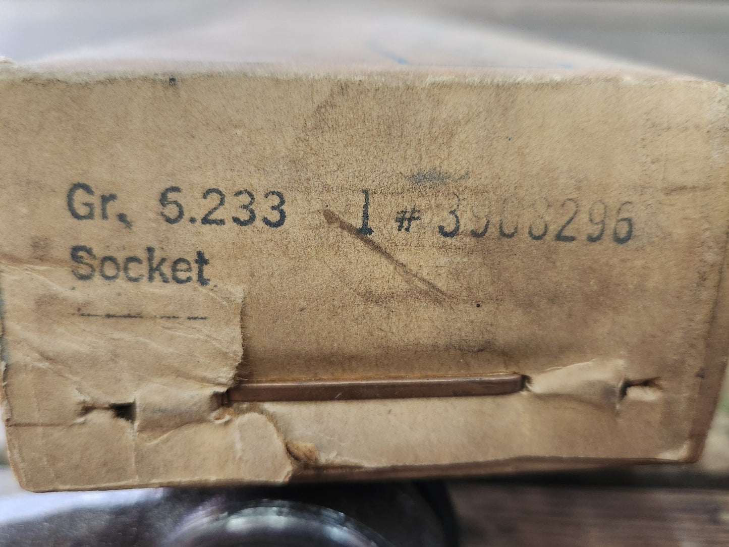 7707895
