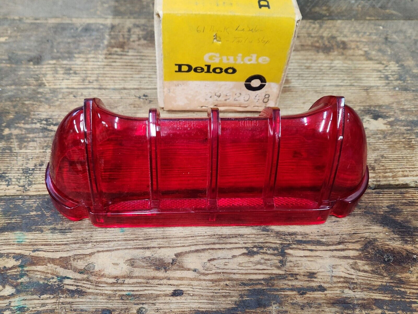 NOS OEM GM 1961 BUICK LESABRE GUIDE RH TAIL LIGHT LENS 5952048 Guide Delco