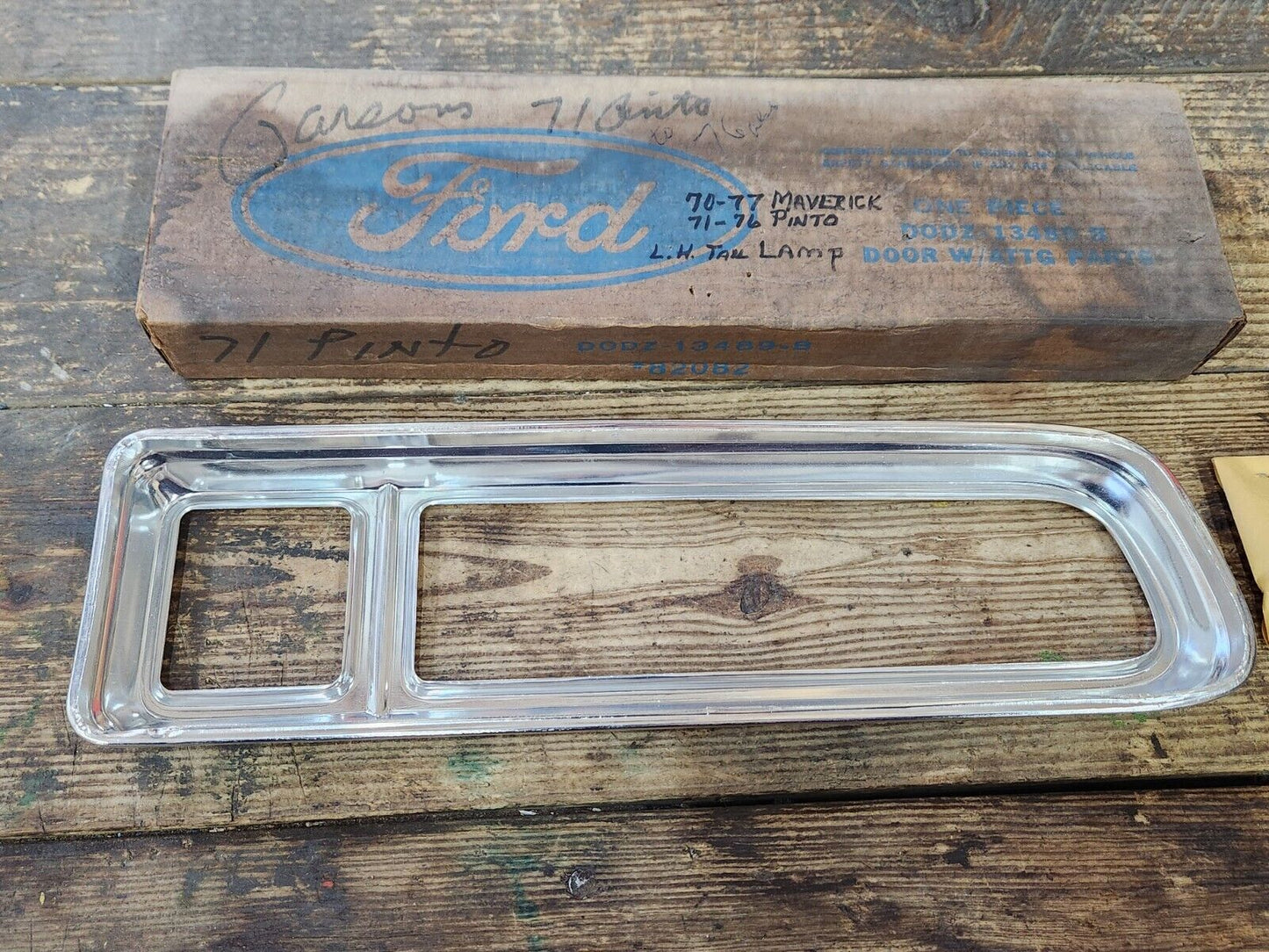 NOS OEM 1970-77 Ford Maverick LH Tail Light lamp Door Chrome Bezel D0DZ-13489-B