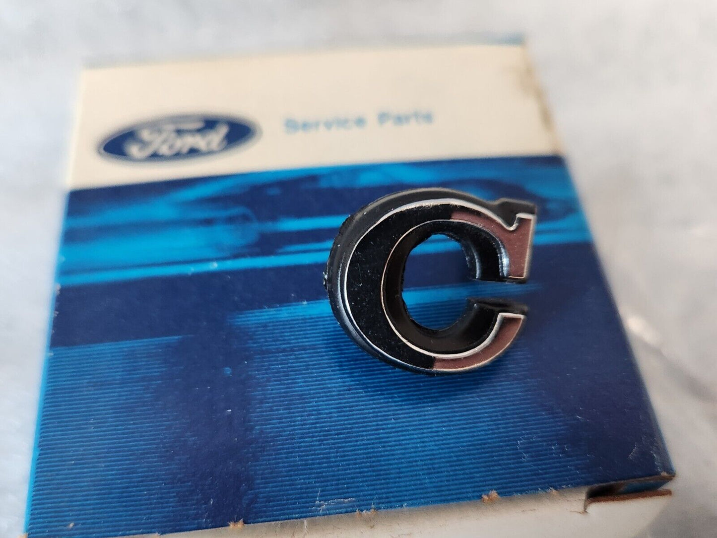 NOS 75 76 77 78 79 FORD MERCURY "C" EMBLEM BADGE ORNAMENT D54Y-16606-D