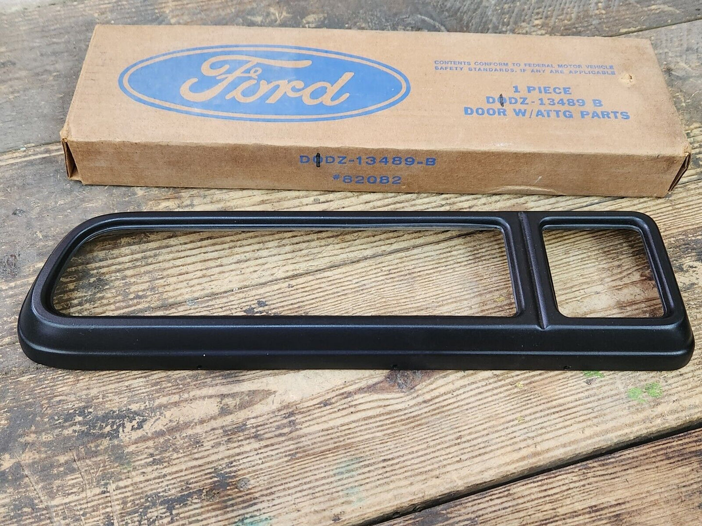 NOS OEM 1970-77 Ford Maverick Grabber LH Tail lamp Door Black Bezel D1DZ-13489-B