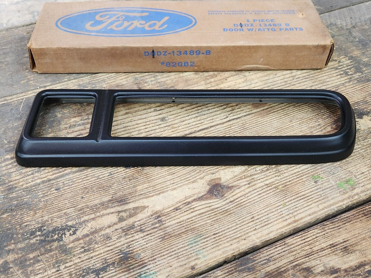 NOS OEM 1970-77 Ford Maverick Grabber LH Tail lamp Door Black Bezel D1DZ-13489-B