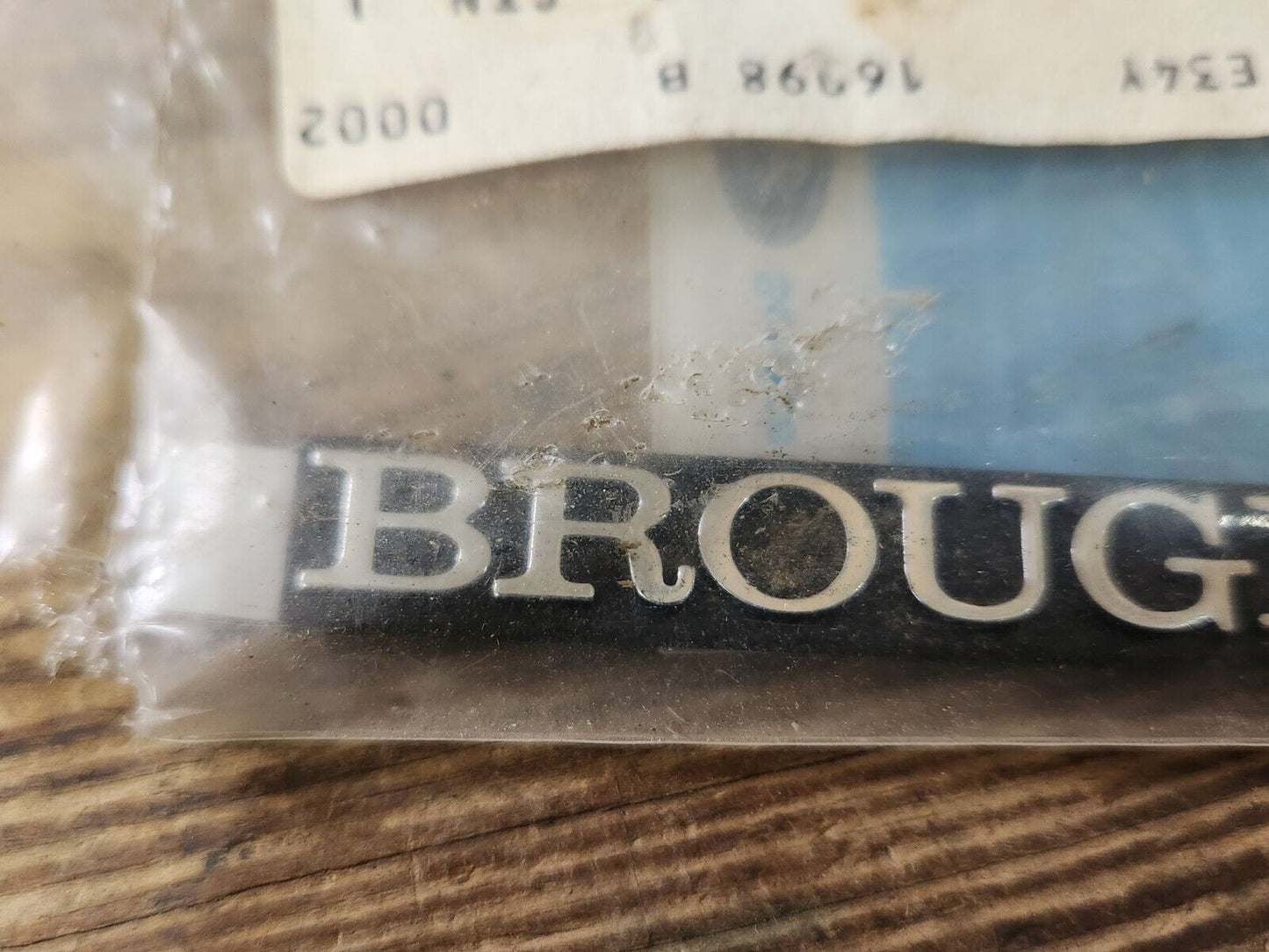 NOS OEM 1979-91 Mercury Grand Marquis Fender Ornament Emblem "Brougham"