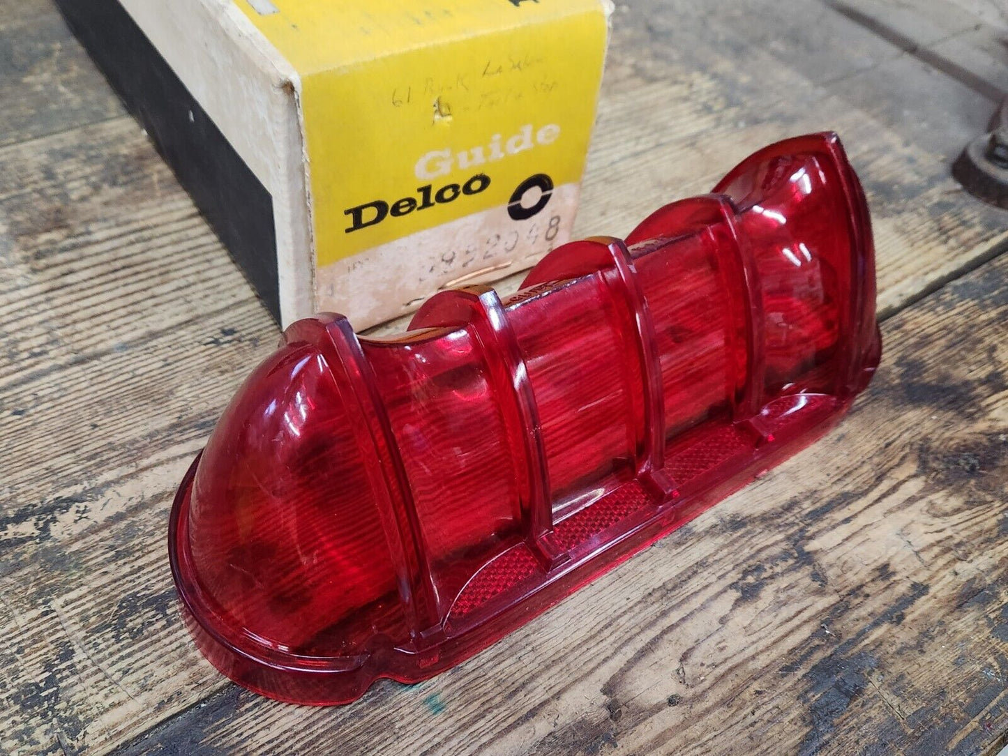 NOS OEM GM 1961 BUICK LESABRE GUIDE RH TAIL LIGHT LENS 5952048 Guide Delco