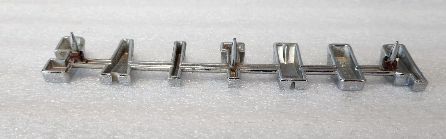 1961 61 OEM GM Pontiac Tempest Wagon Rear Door Gate Emblem 4813935