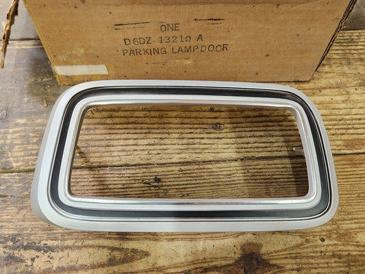 NOS OEM 1976 Ford Maverick Right Hand Parking Lamp Door Bezel D6DZ-13210-A