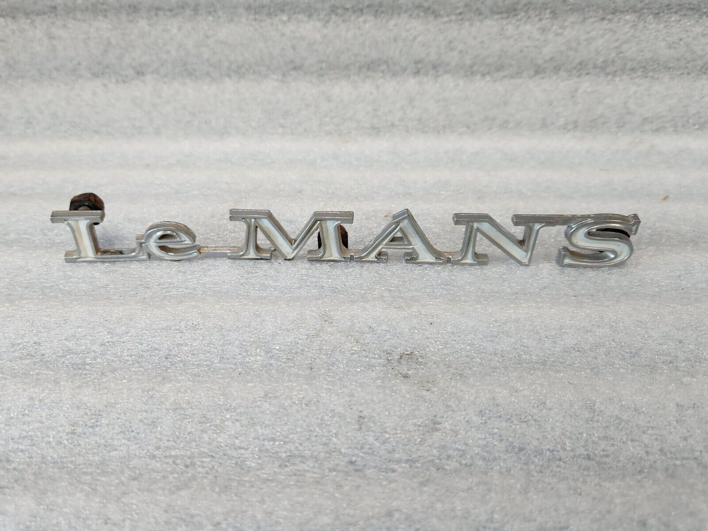 1970 PONTIAC LEMANS  QUARTER PANEL EMBLEM ORIGINAL GM PART NUMBER 9808250