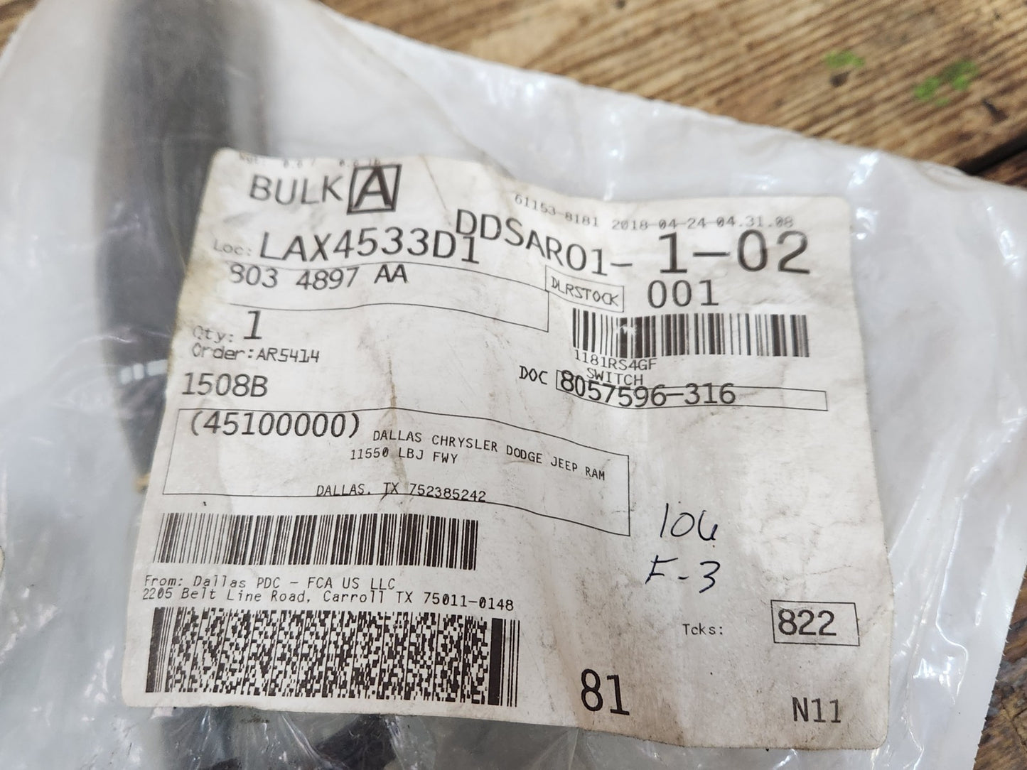 6933573