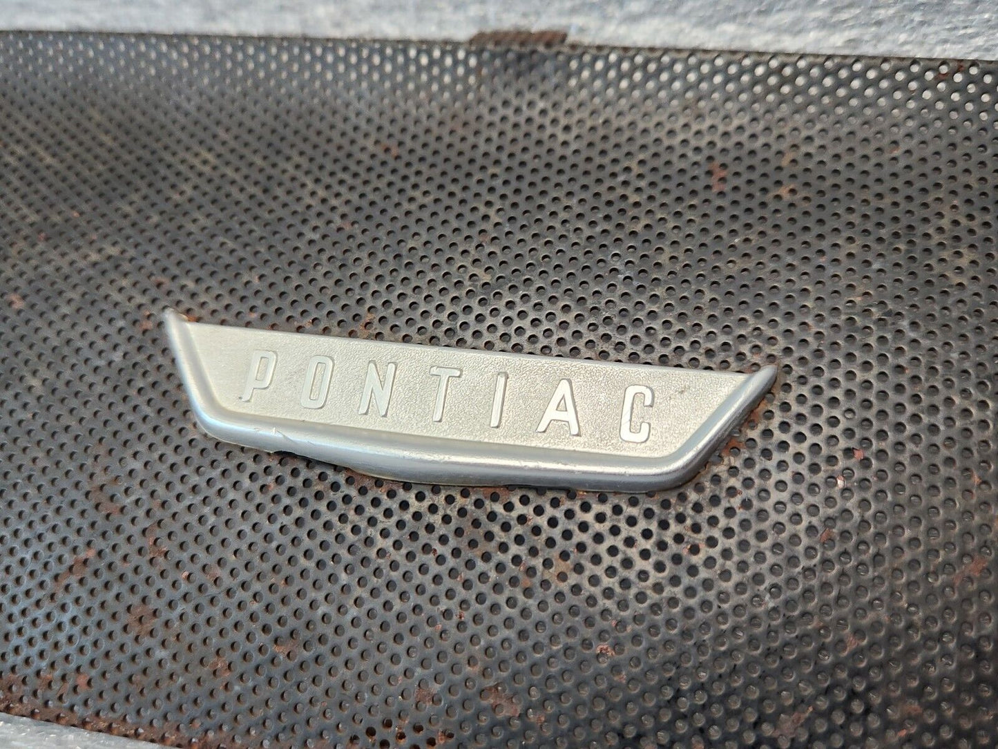 1956 PONTIAC CHIEFTAIN SPEAKER GRILLE w/ METAL EMBLEM OEM GM