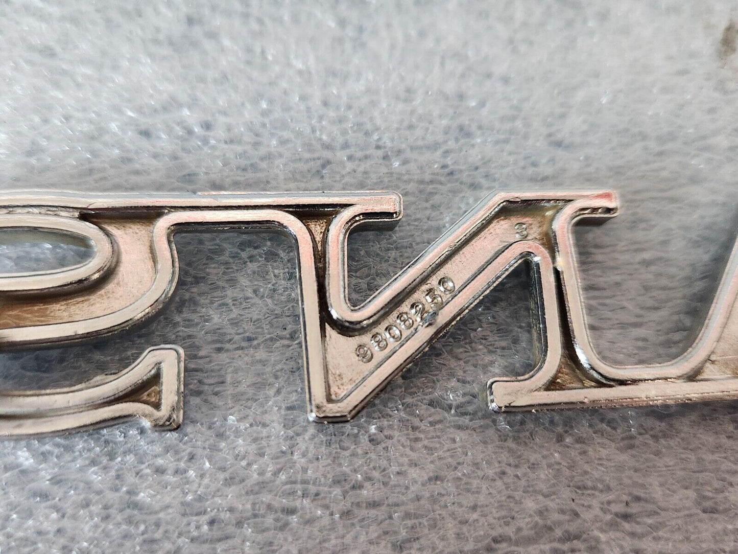 1970 PONTIAC LEMANS  QUARTER PANEL EMBLEM ORIGINAL GM PART NUMBER 9808250