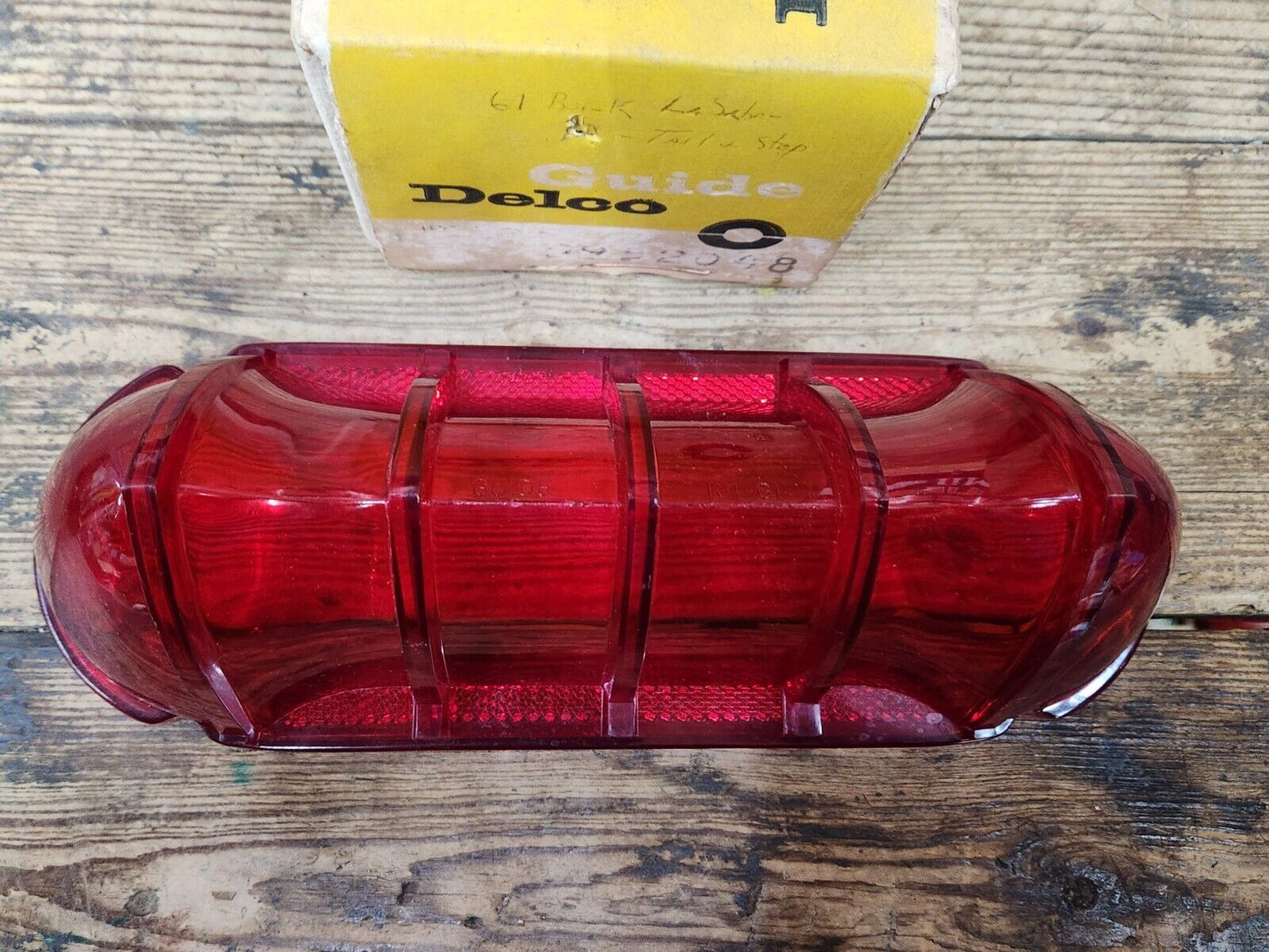 NOS OEM GM 1961 BUICK LESABRE GUIDE RH TAIL LIGHT LENS 5952048 Guide Delco