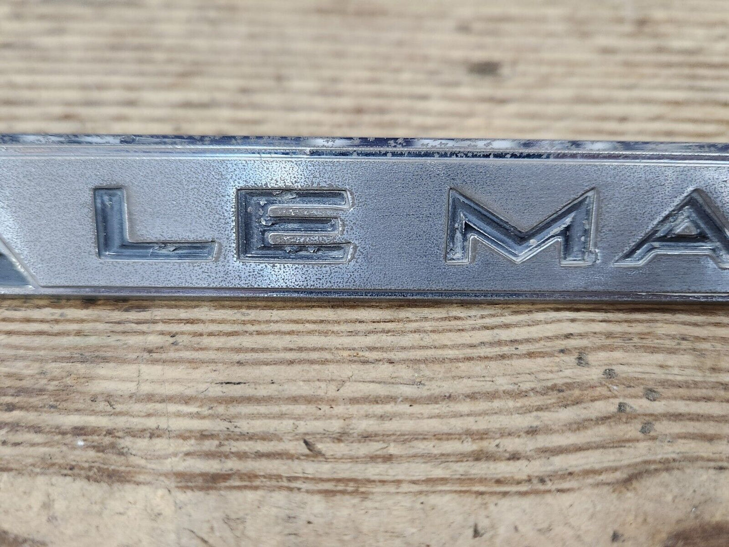 1964 1965 PONTIAC LEMANS L.H. DRIVER FENDER EMBLEM OEM GM 4414093