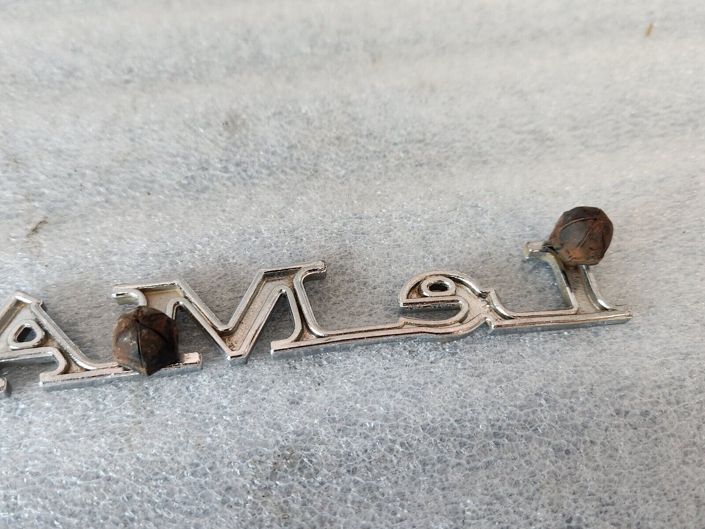 1970 PONTIAC LEMANS  QUARTER PANEL EMBLEM ORIGINAL GM PART NUMBER 9808250