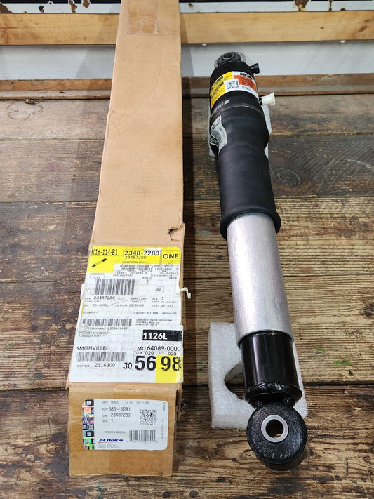 NOS OEM GM Rear Z95 Air Lift Shock Absorber 08-14 Escalade Yukon Tahoe  23487280