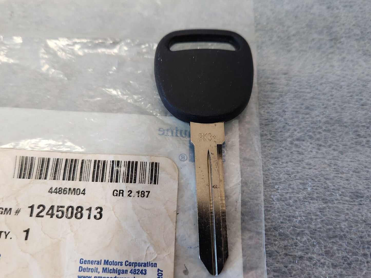 NOS OEM GM Cadillac CTS 2003-2007 Transponder Chip Jewel Logo Key 12450813 NEW